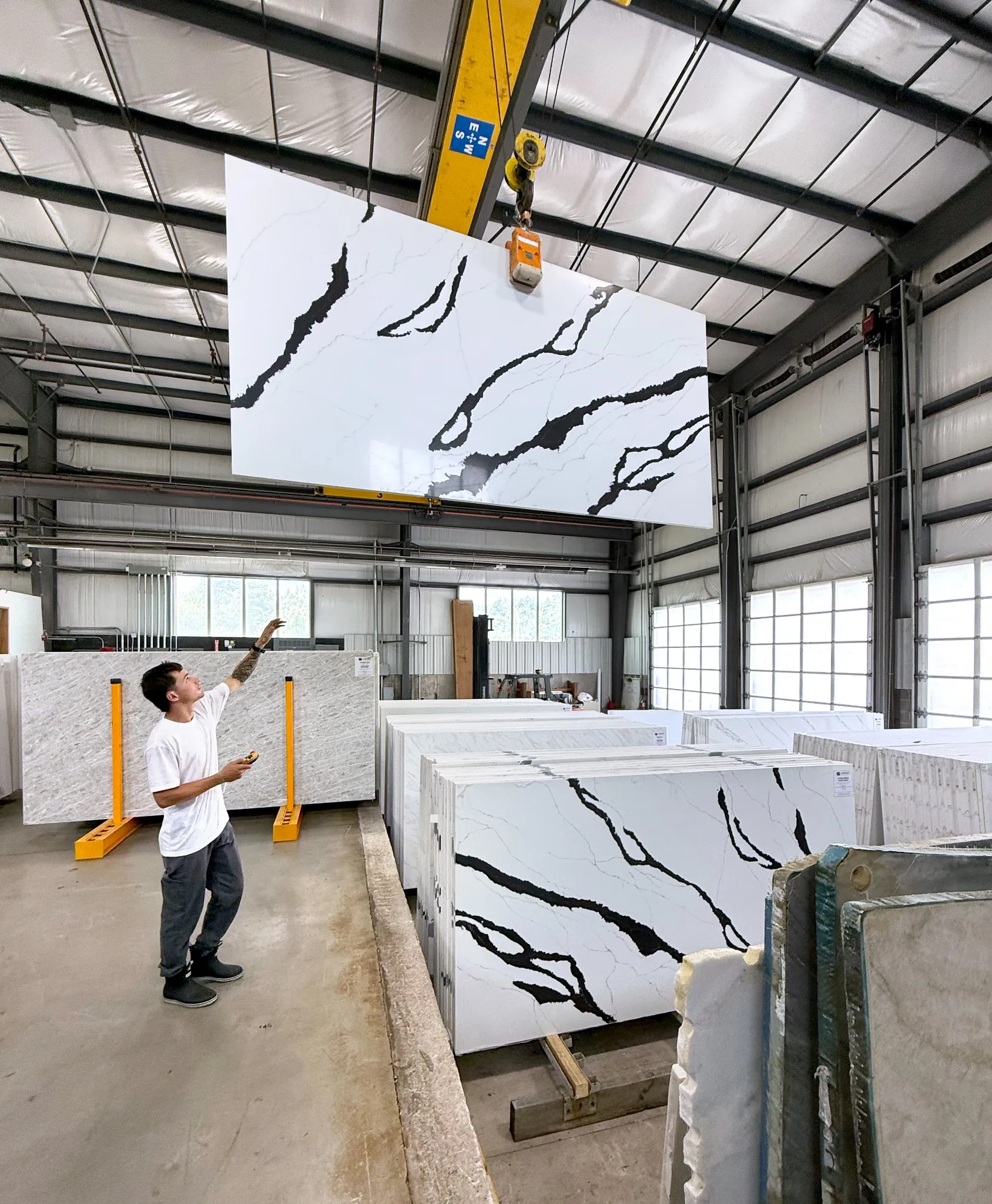 Natural stone handling inside the Caruso warehouse