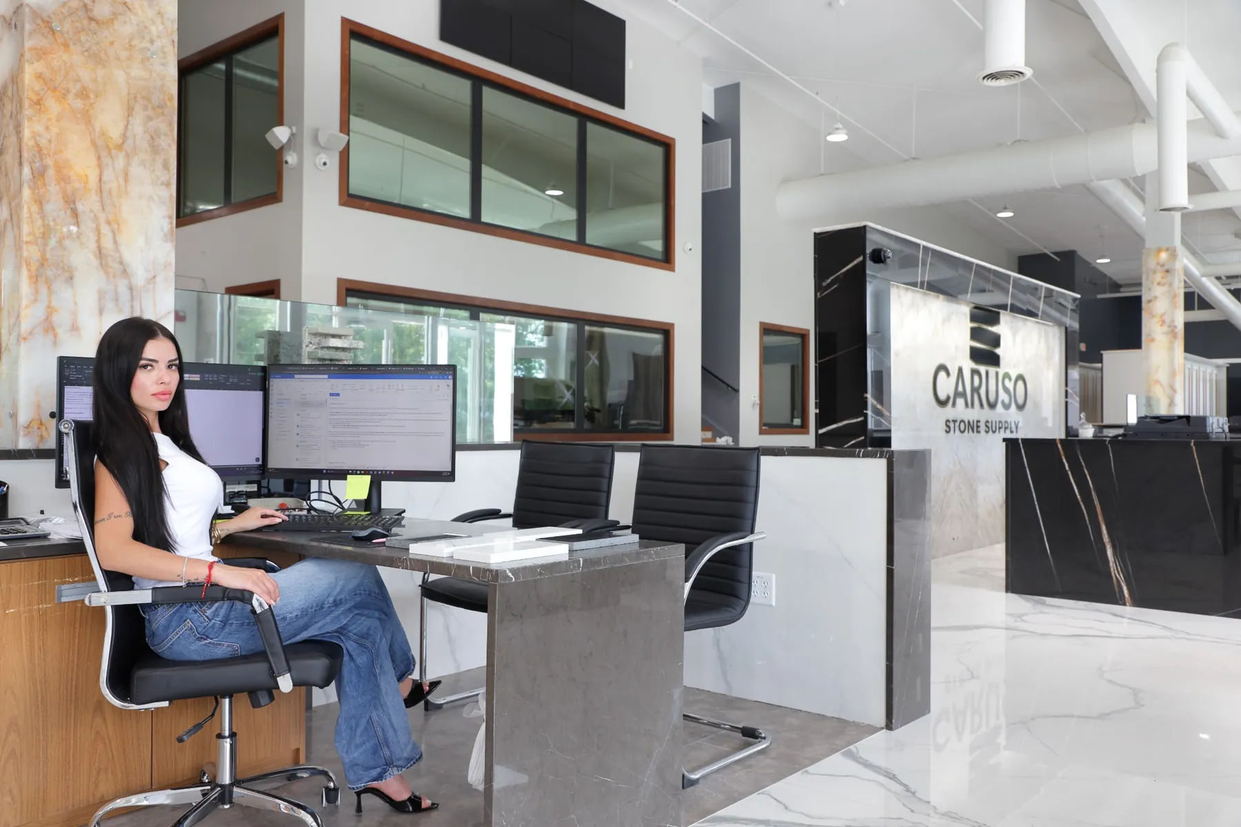 Caruso Stone Supply team desk and showroom