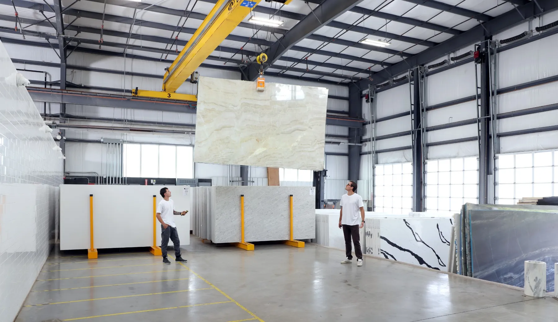 Overhead crane inside the Caruso Stone Supply warehouse